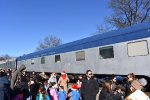 Nickel Plate Sleeper Car # 211 glistens in the sun as the crowd is as jubilent as possible